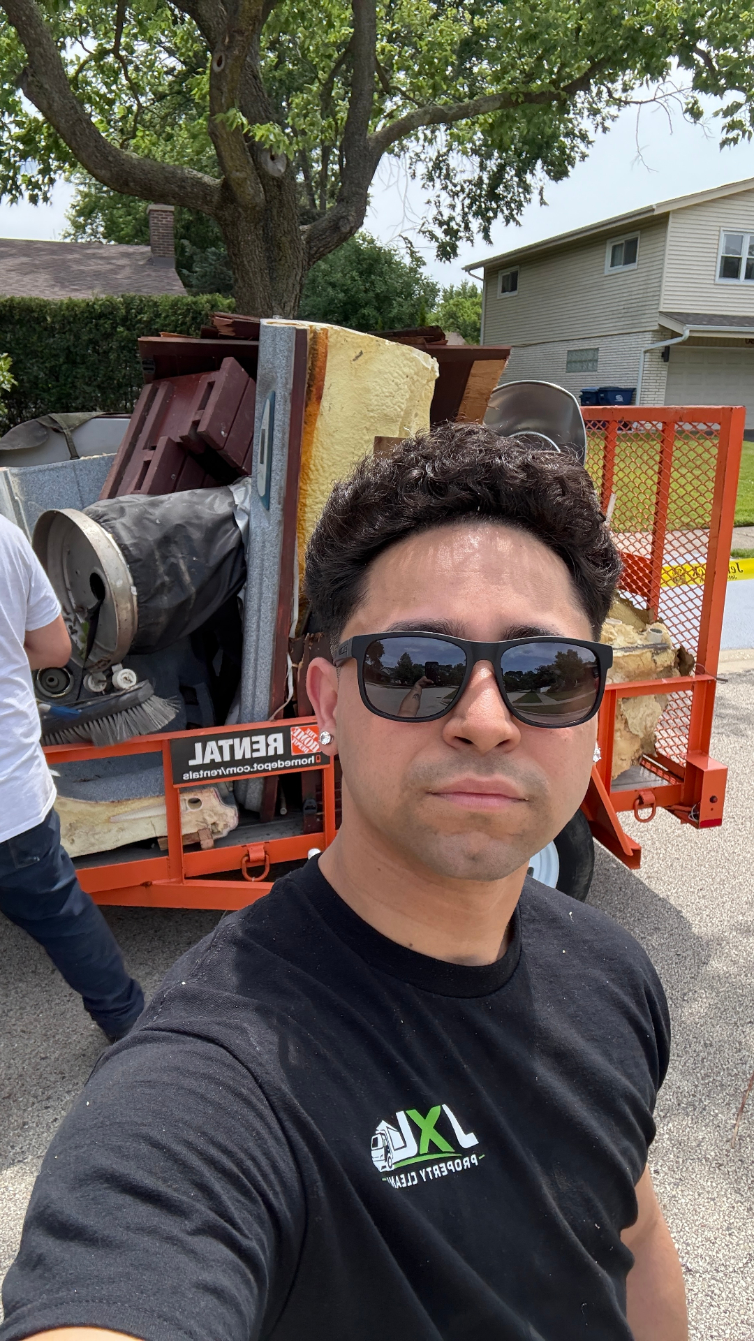 Hot tub demolition Deerfield Illinois — trailer fully loaded with broken jacuzzi pieces ready for disposal