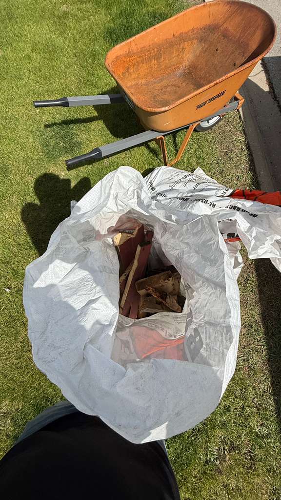 Filled demo bag with broken patio wood in Schaumburg
