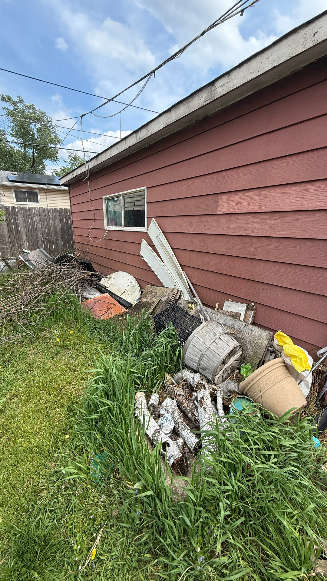 Tires and rotted wood before cleanup Wheeling IL