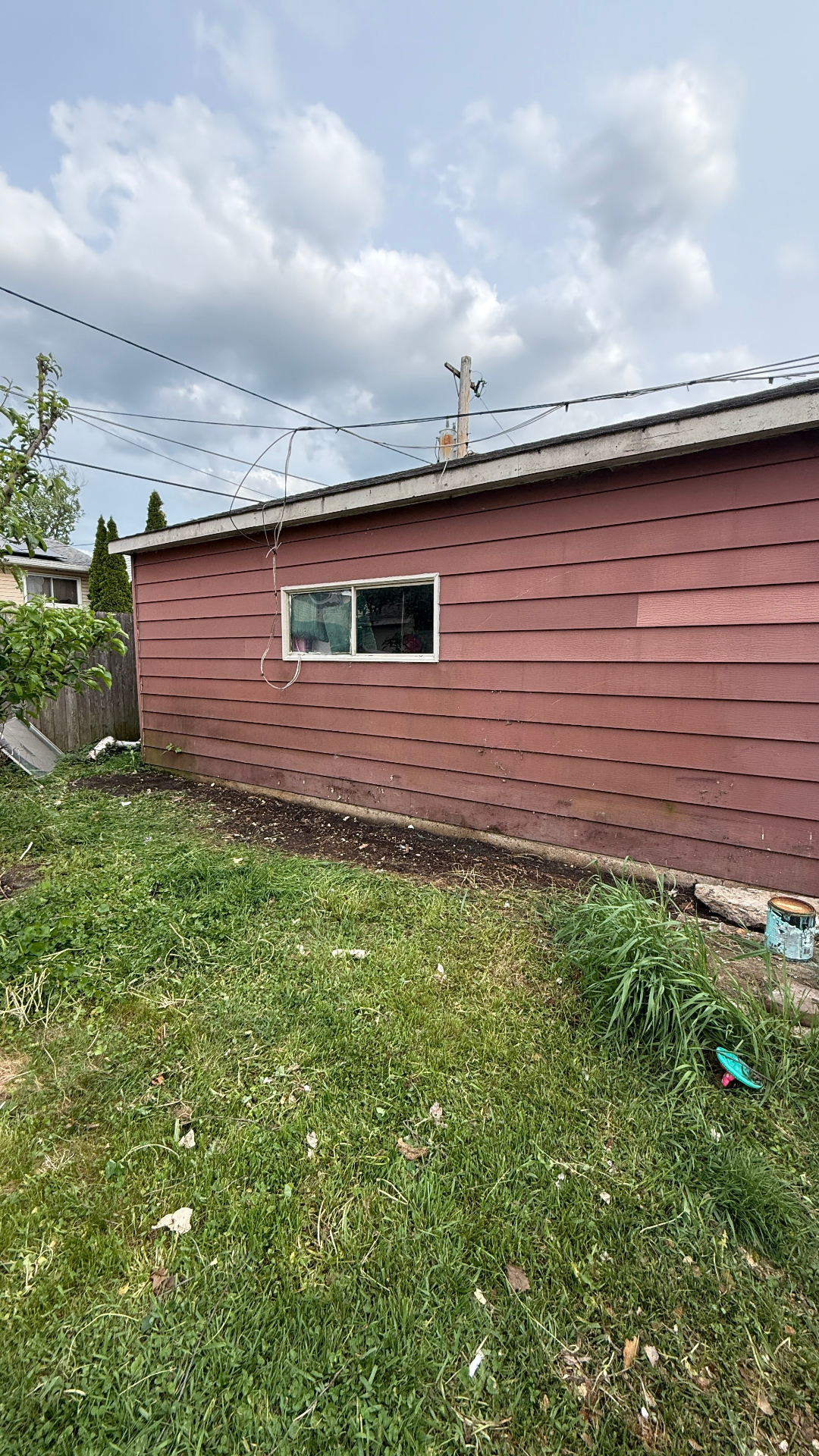 Wheeling backyard side yard after cleanup