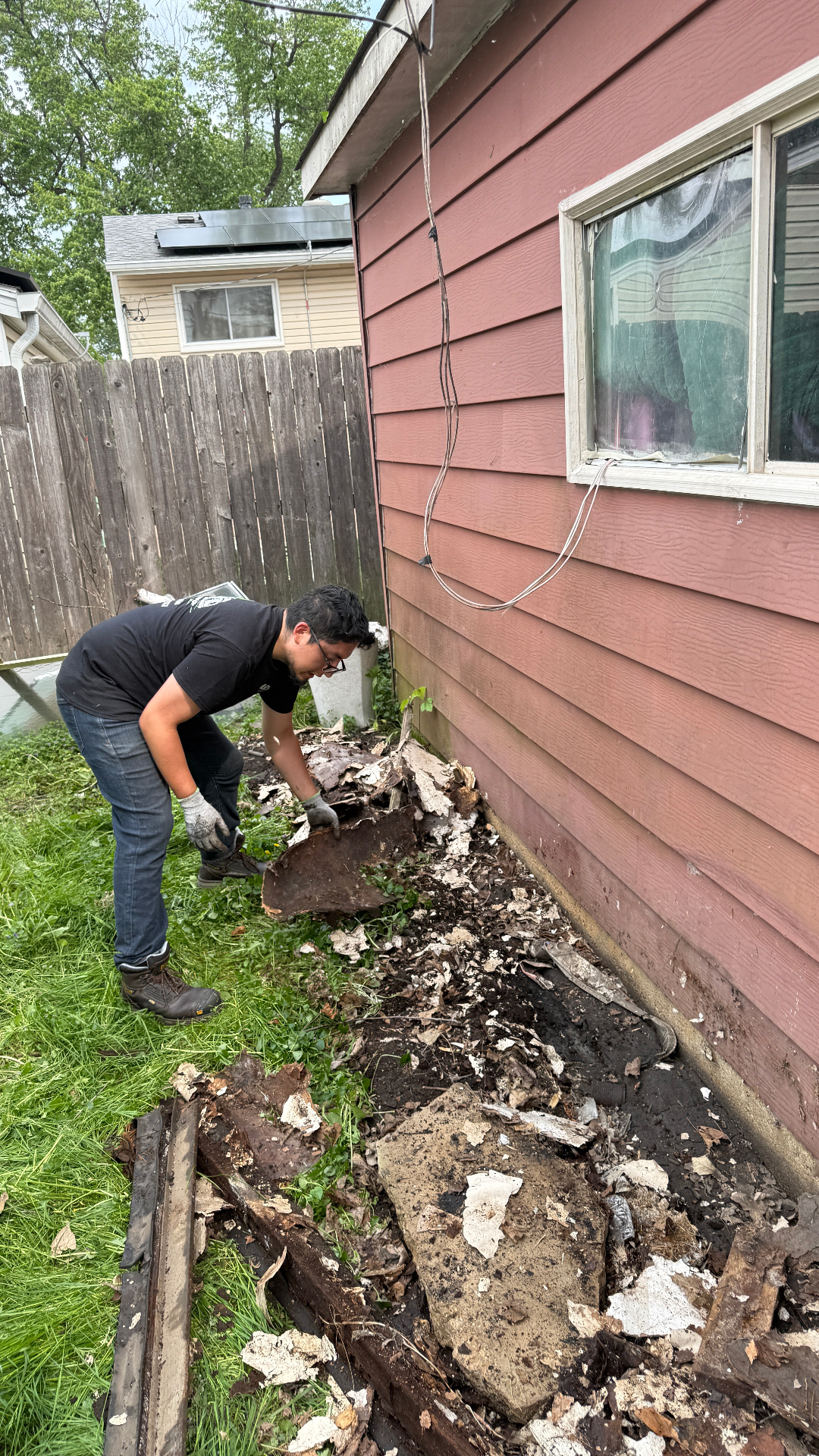 Backyard cleanup service Wheeling — debris hauling and yard cleanup