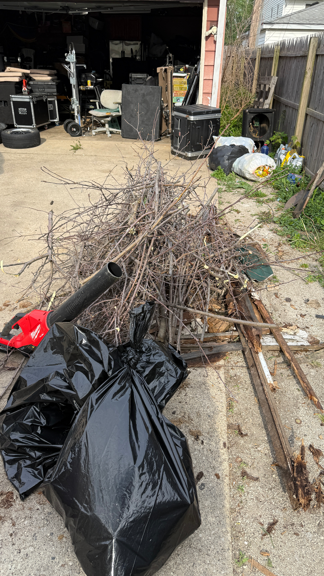 Garage side cleanup Wheeling Illinois — exterior junk removal